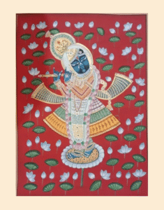 Pichwai painting of Shrinathji with lotus motif on a red background in traditional Rajasthani style.