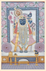 Pichwai painting of Shrinathji with pink floral backdrop and traditional Rajasthani design.