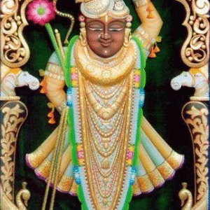 Shrinathji Rajbhog golden hand-painted wooden artwork with ornate carved frame.
