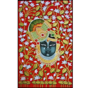 Traditional handmade Shrinathji Pichwai painting featuring the divine face of Lord Shrinathji surrounded by white lotus flowers on a red background – Nathdwara art