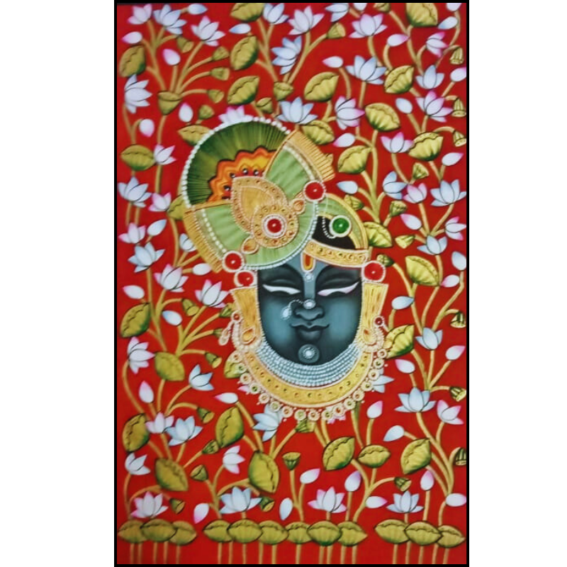 Traditional handmade Shrinathji Pichwai painting featuring the divine face of Lord Shrinathji surrounded by white lotus flowers on a red background – Nathdwara art